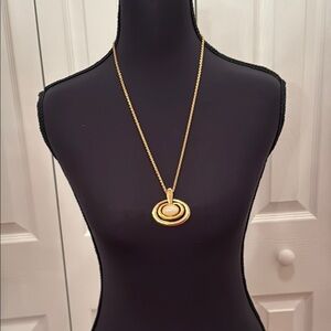 Gold Tone Statement Necklace with Intricate Pendant